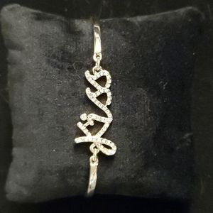 Avon  pave kiss bracelet